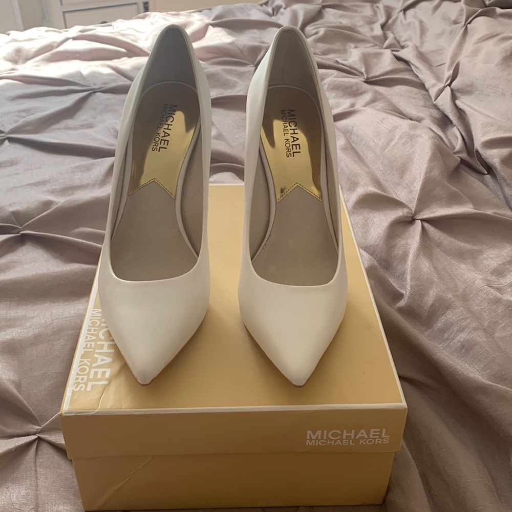 Michael Kors white heels.